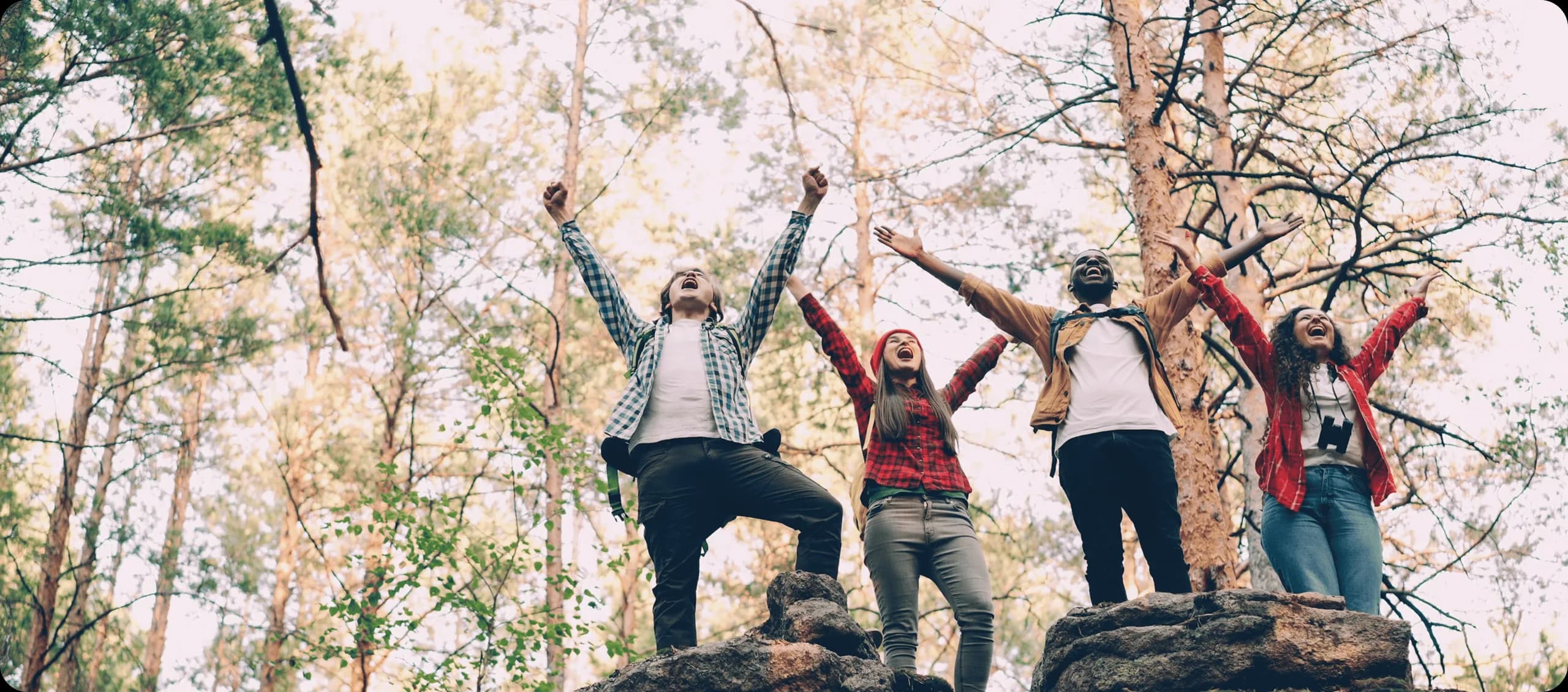 Global eVisa team celebrating outdoors