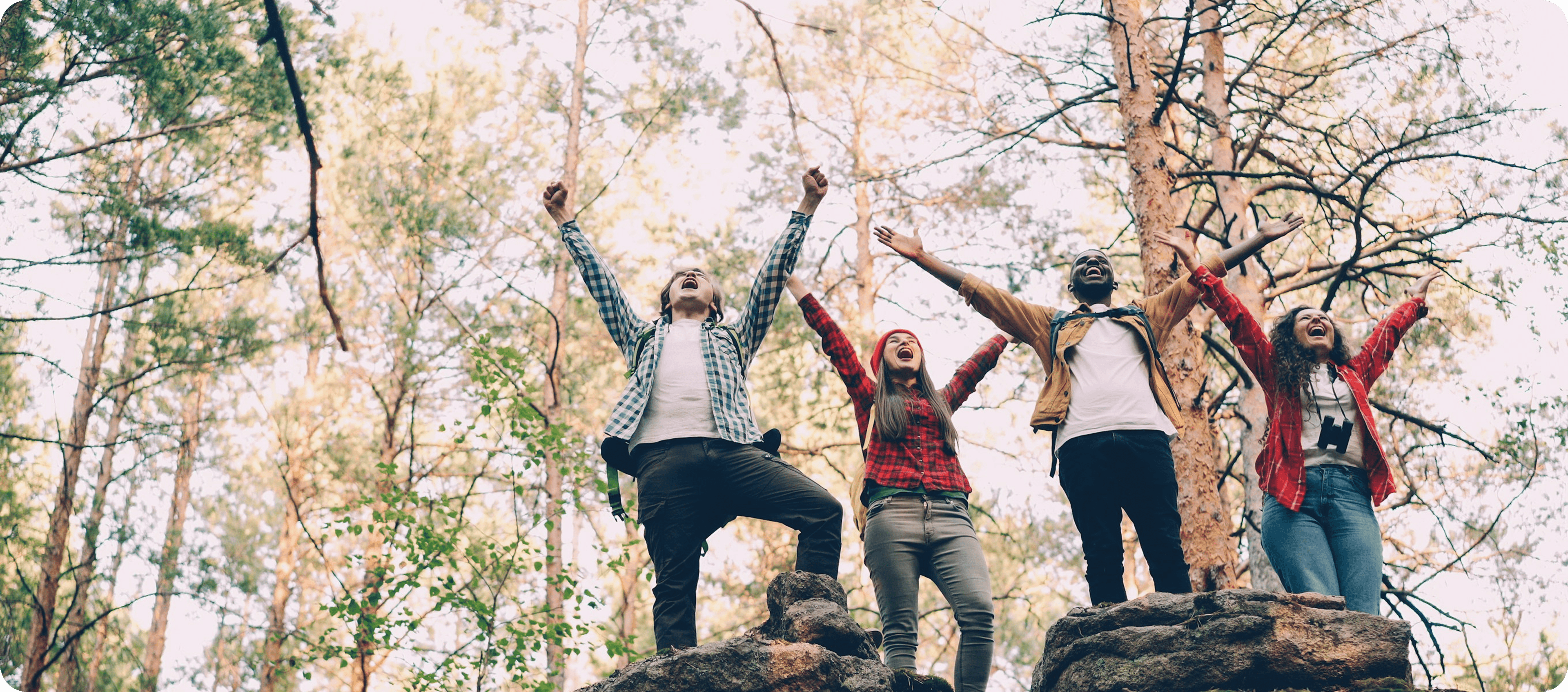 Global eVisa team celebrating outdoors